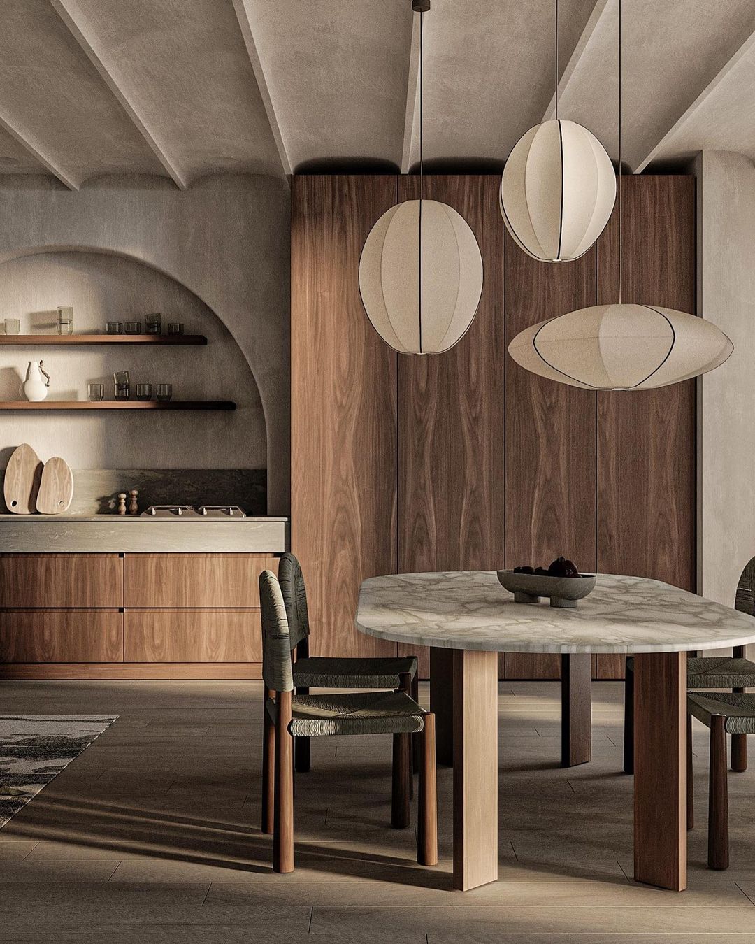 A modern kitchen with sculptural elements and warm tones