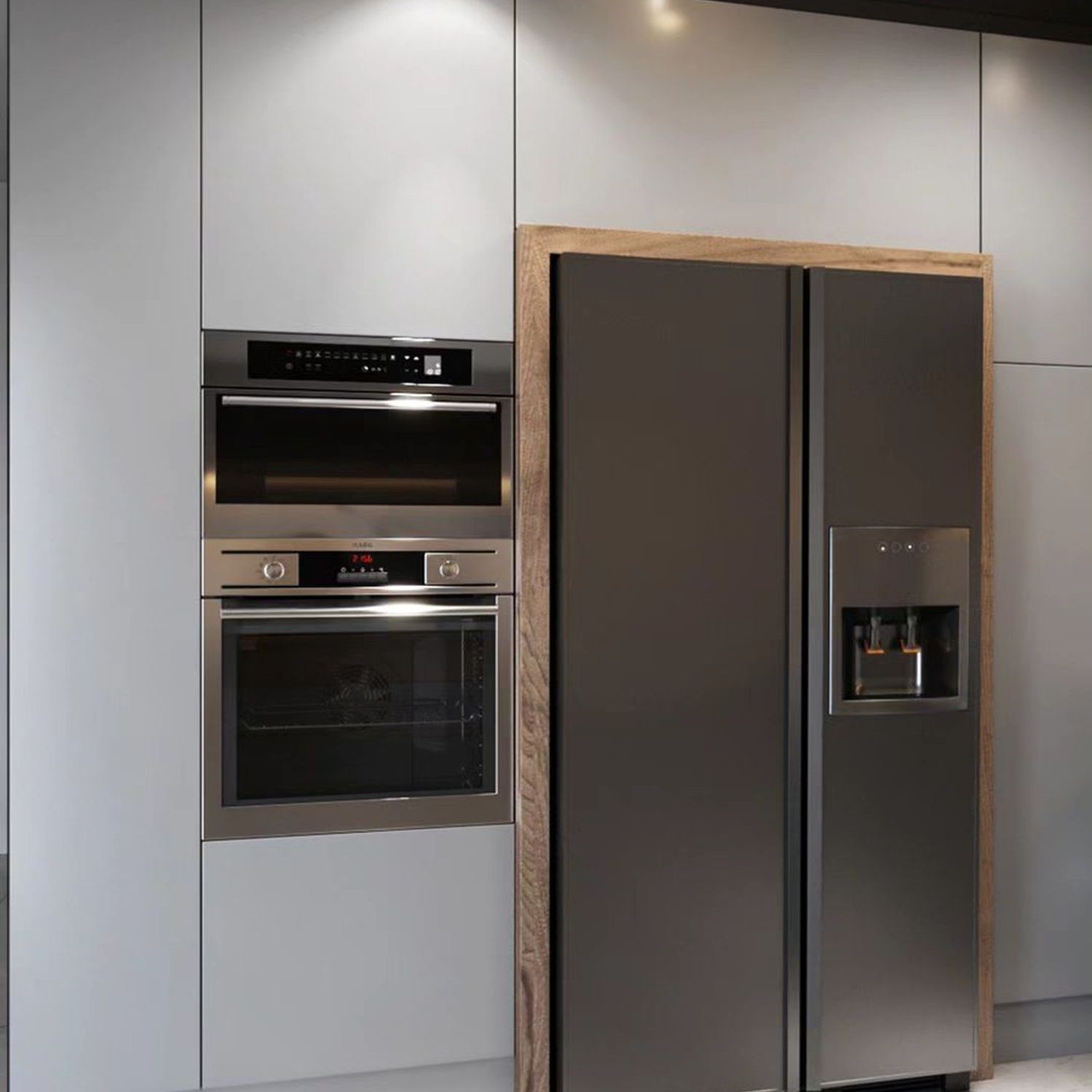 A sleek modern kitchen featuring an integrated refrigerator and high-end stainless steel appliances