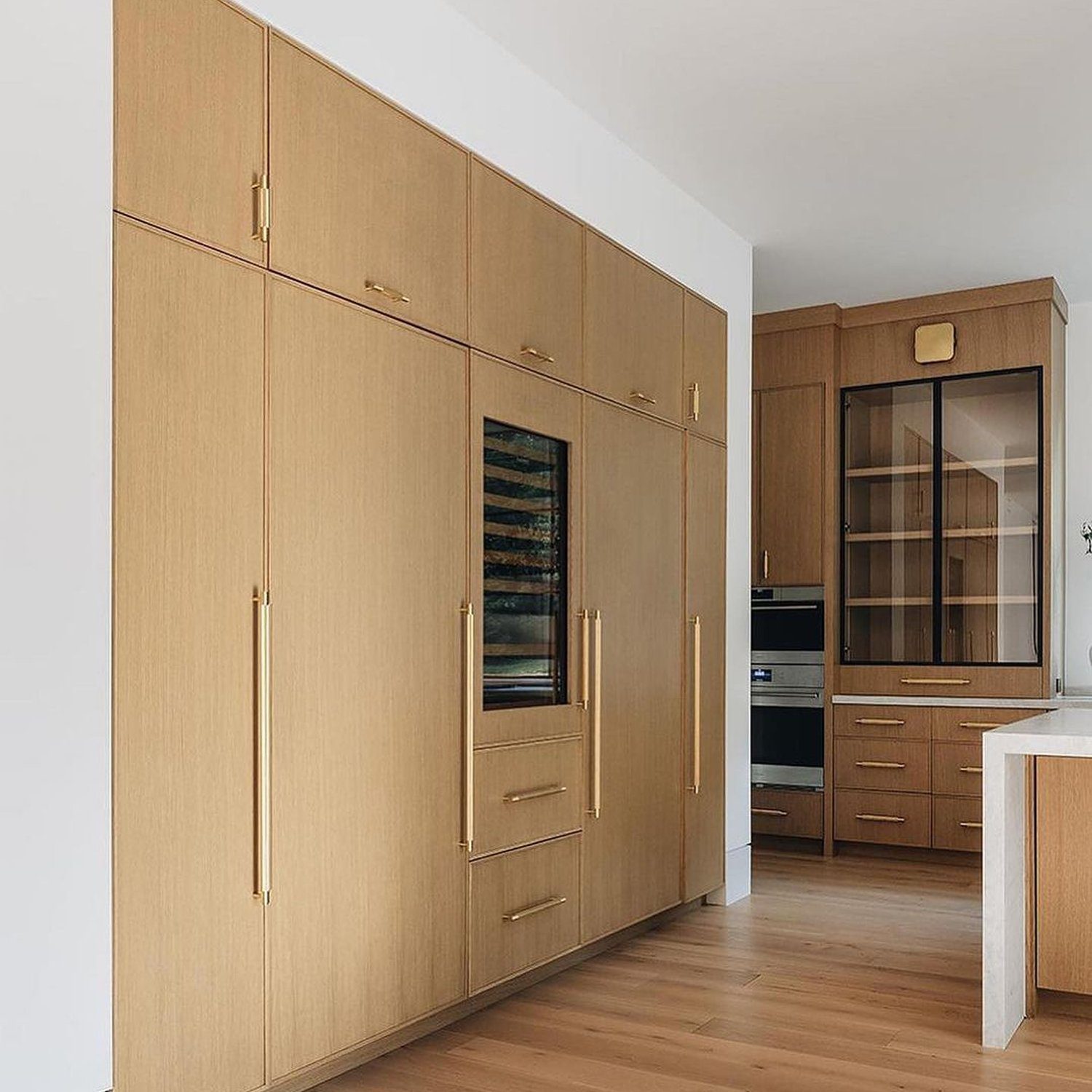 Modern kitchen with seamless wooden cabinetry