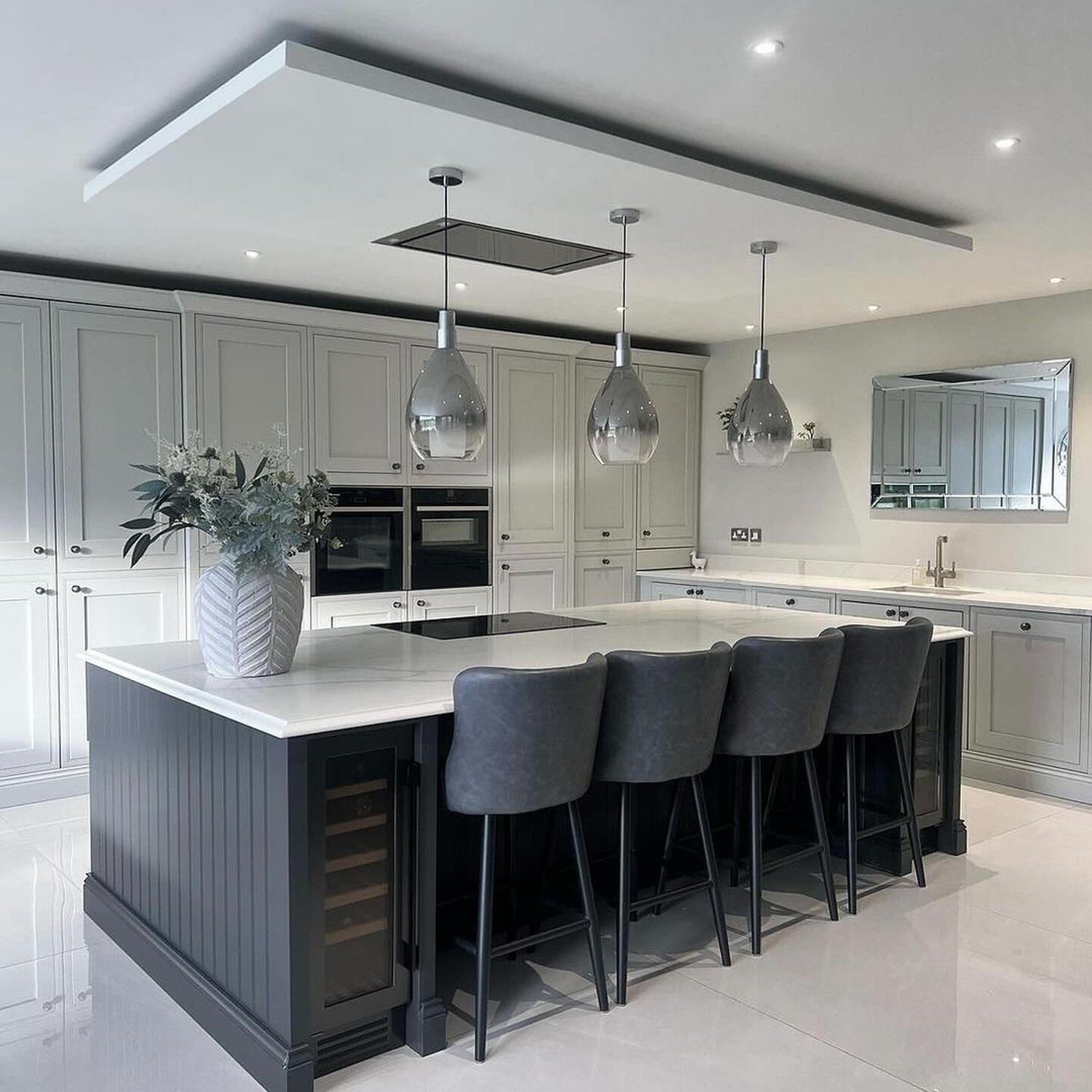 A stylish and contemporary kitchen featuring an elegant design