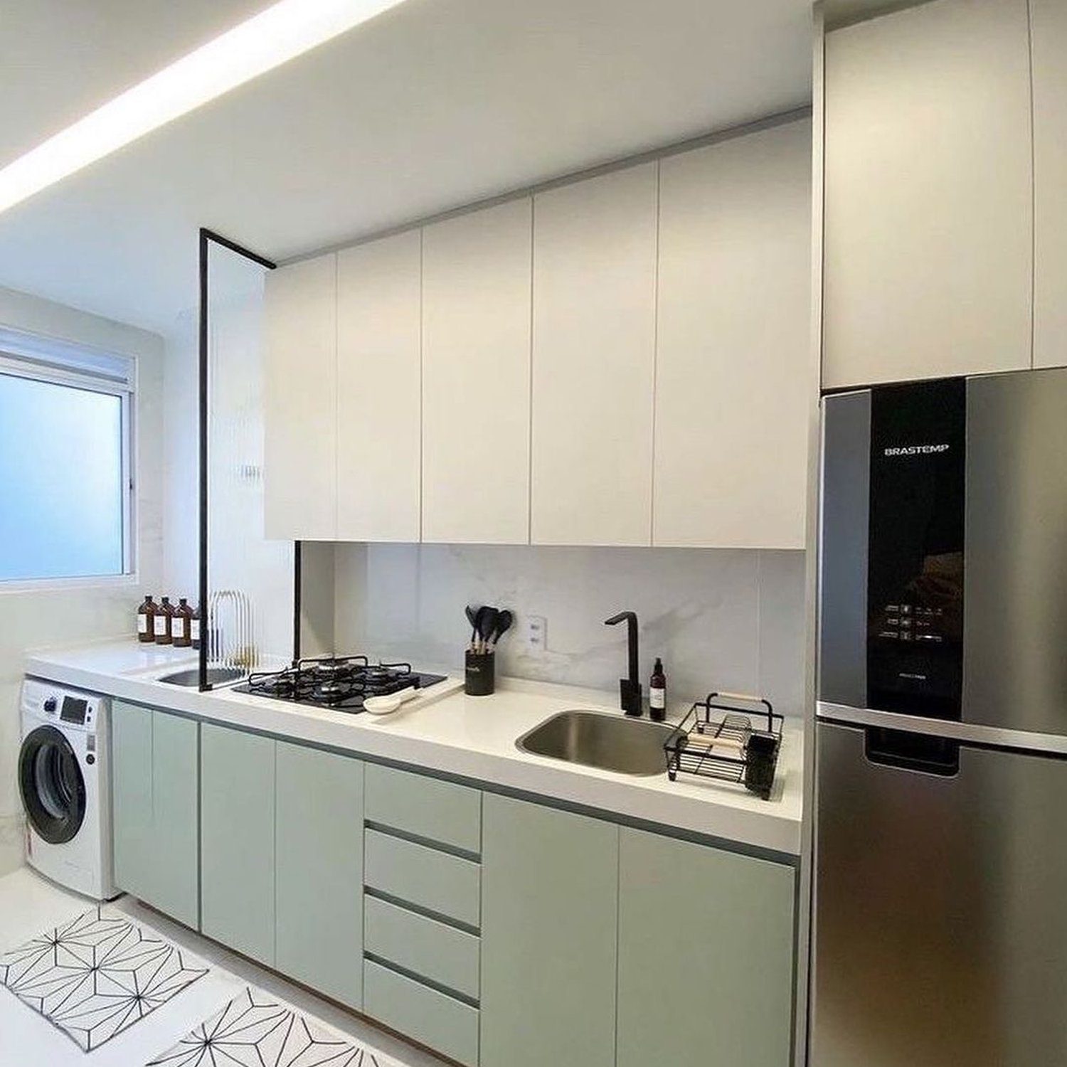 A modern kitchen with sleek cabinetry and built-in appliances