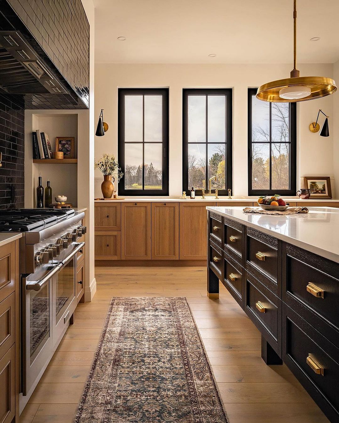 A modern kitchen with contrasting cabinetry