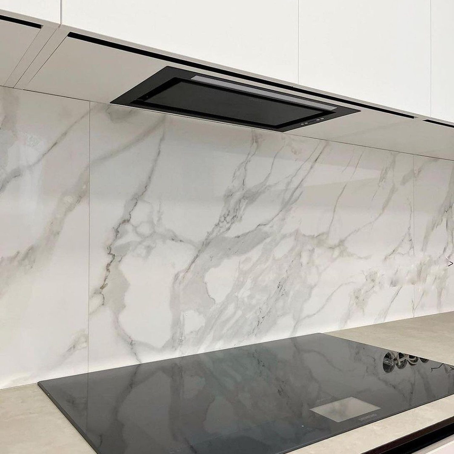 Elegant kitchen with marble backsplash