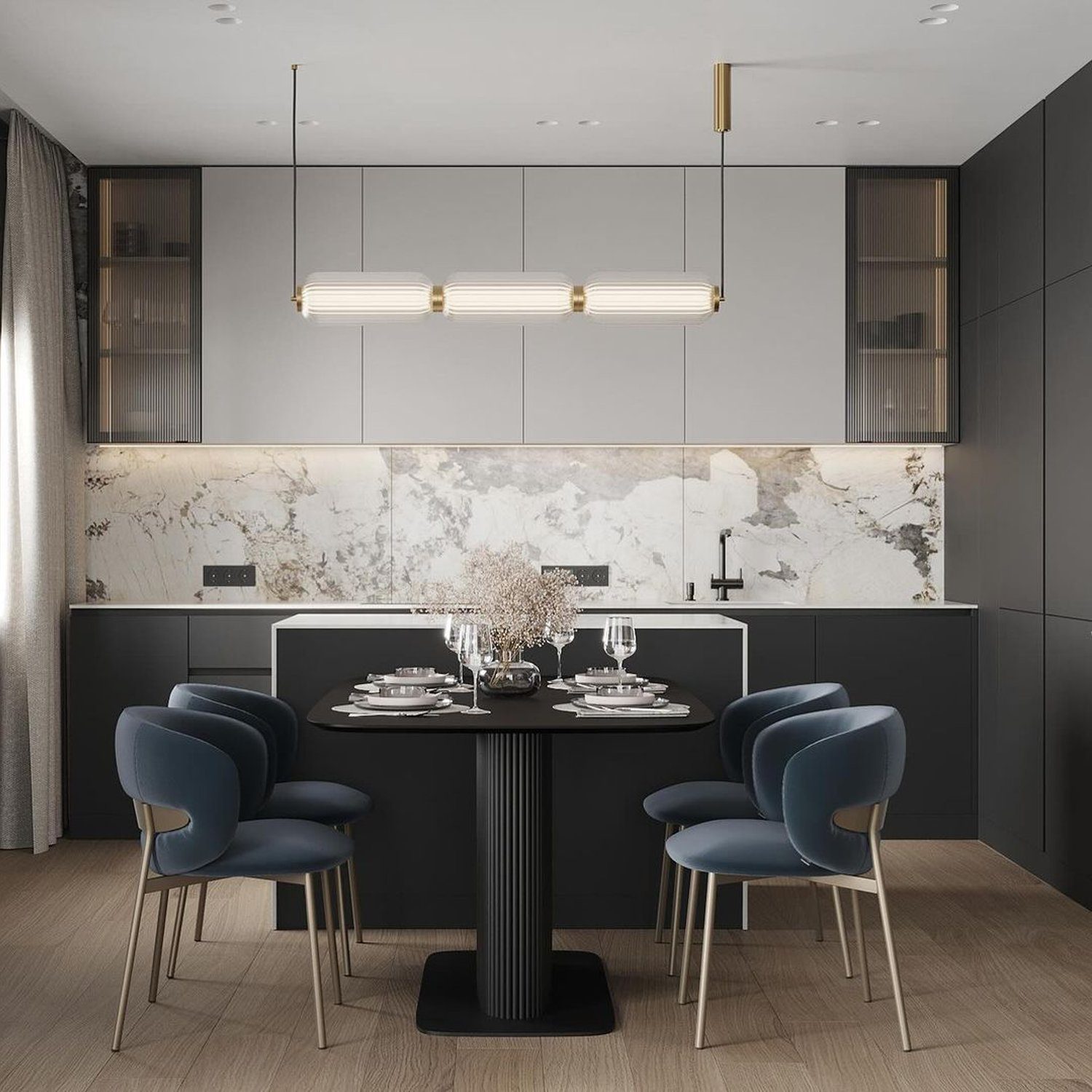 Elegantly laid out modern kitchen with marble backsplash and a central dining area