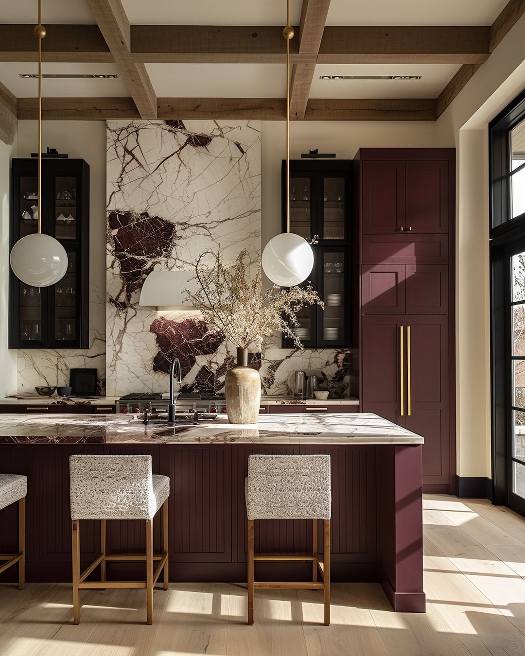 Stylish modern kitchen with bold maroon cabinetry