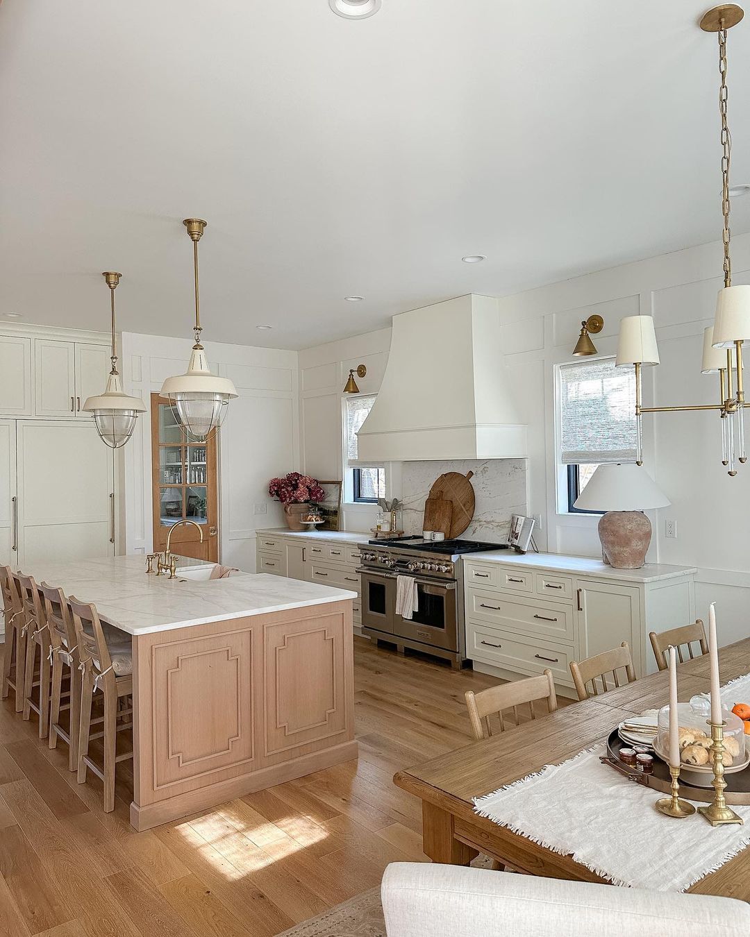 A beautifully designed kitchen with ample natural light and modern fixtures