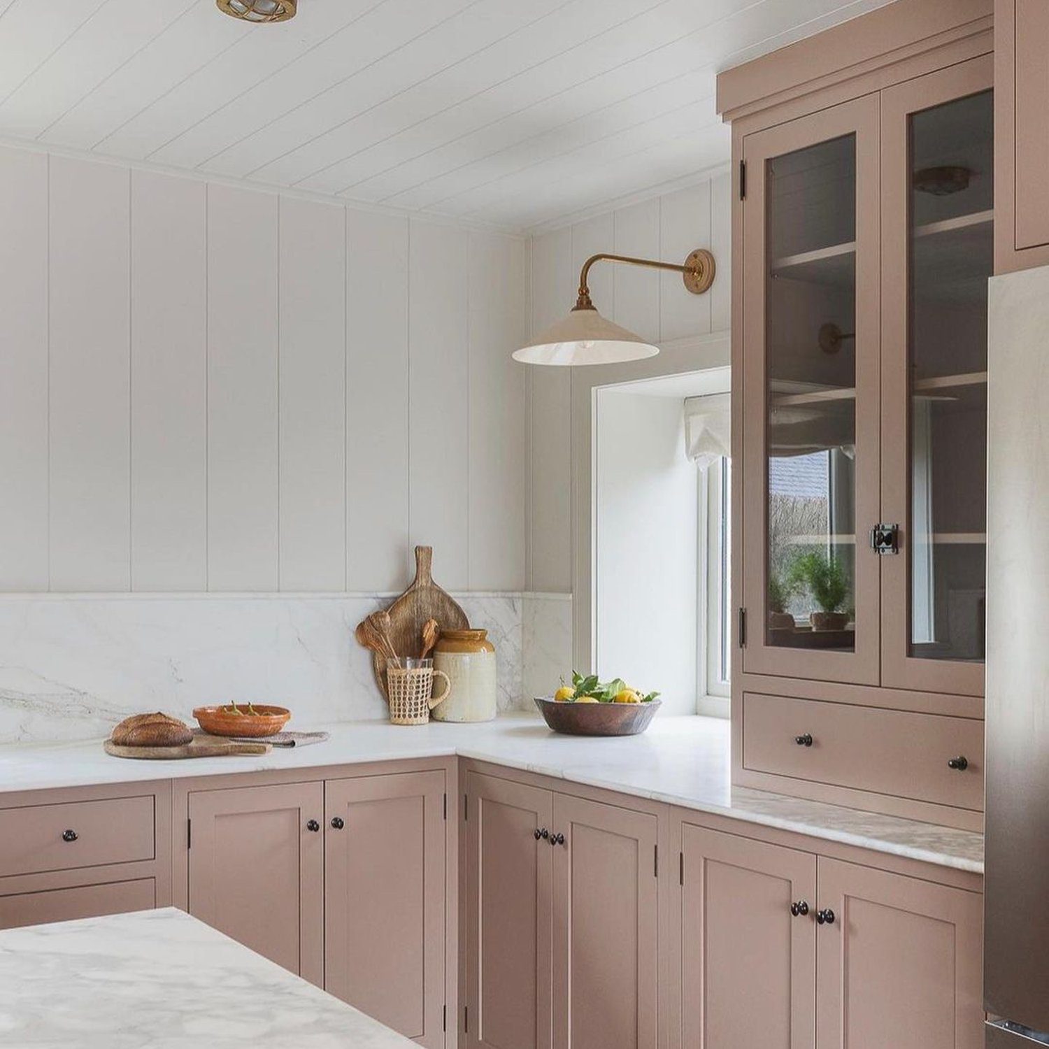 Elegant kitchen design with pastel cabinetry