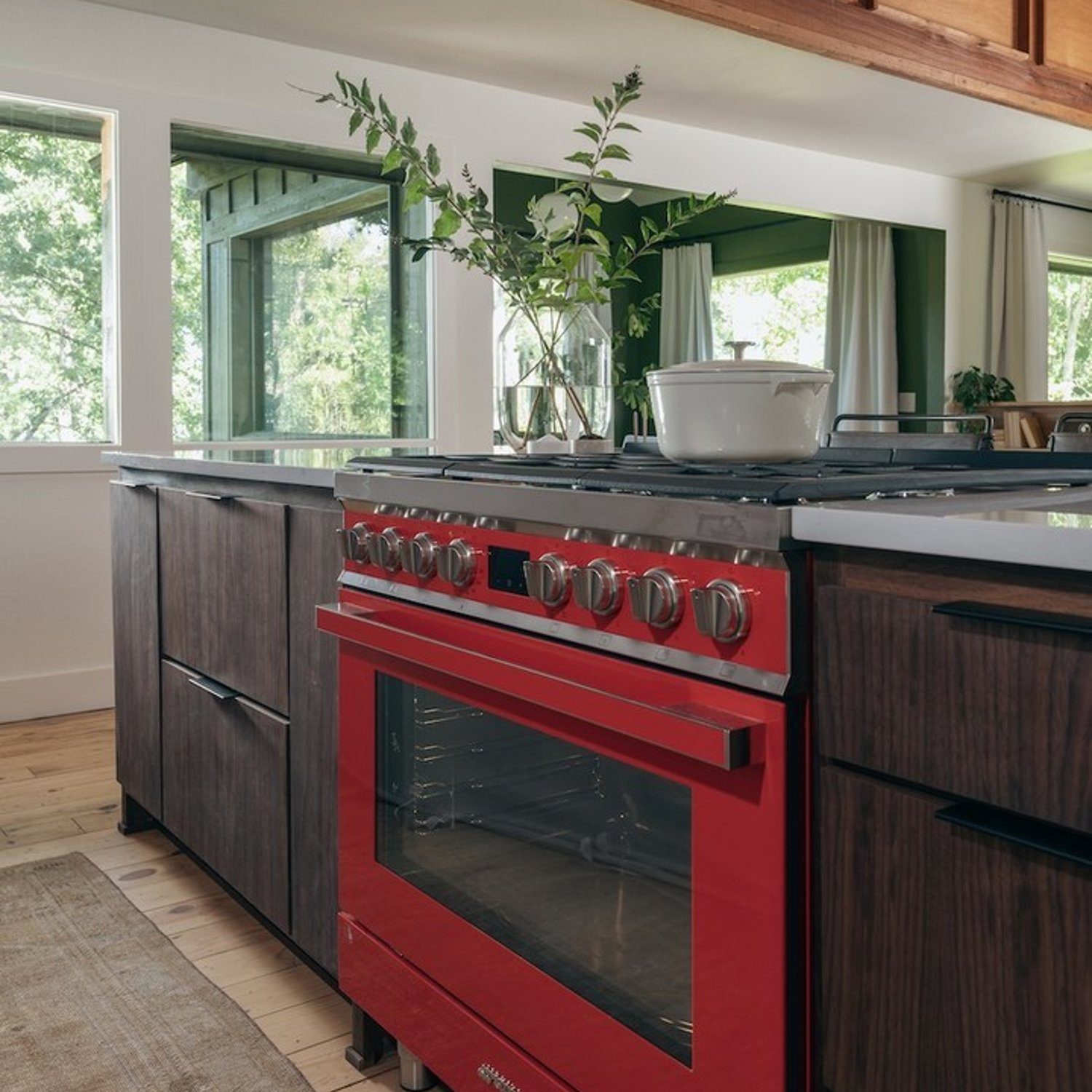 Stylish modern kitchen with a striking red range cooker