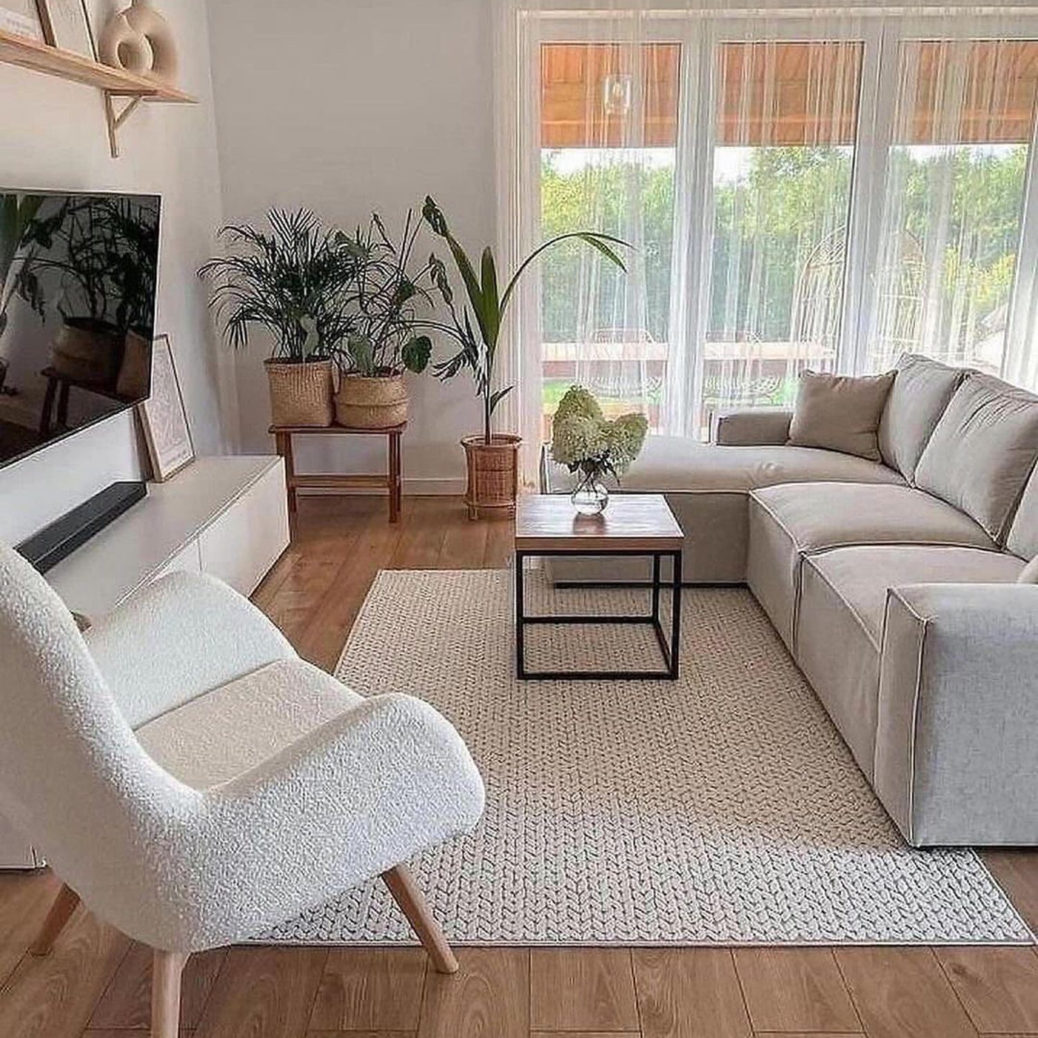 A chic and modern living room with harmonious natural light.