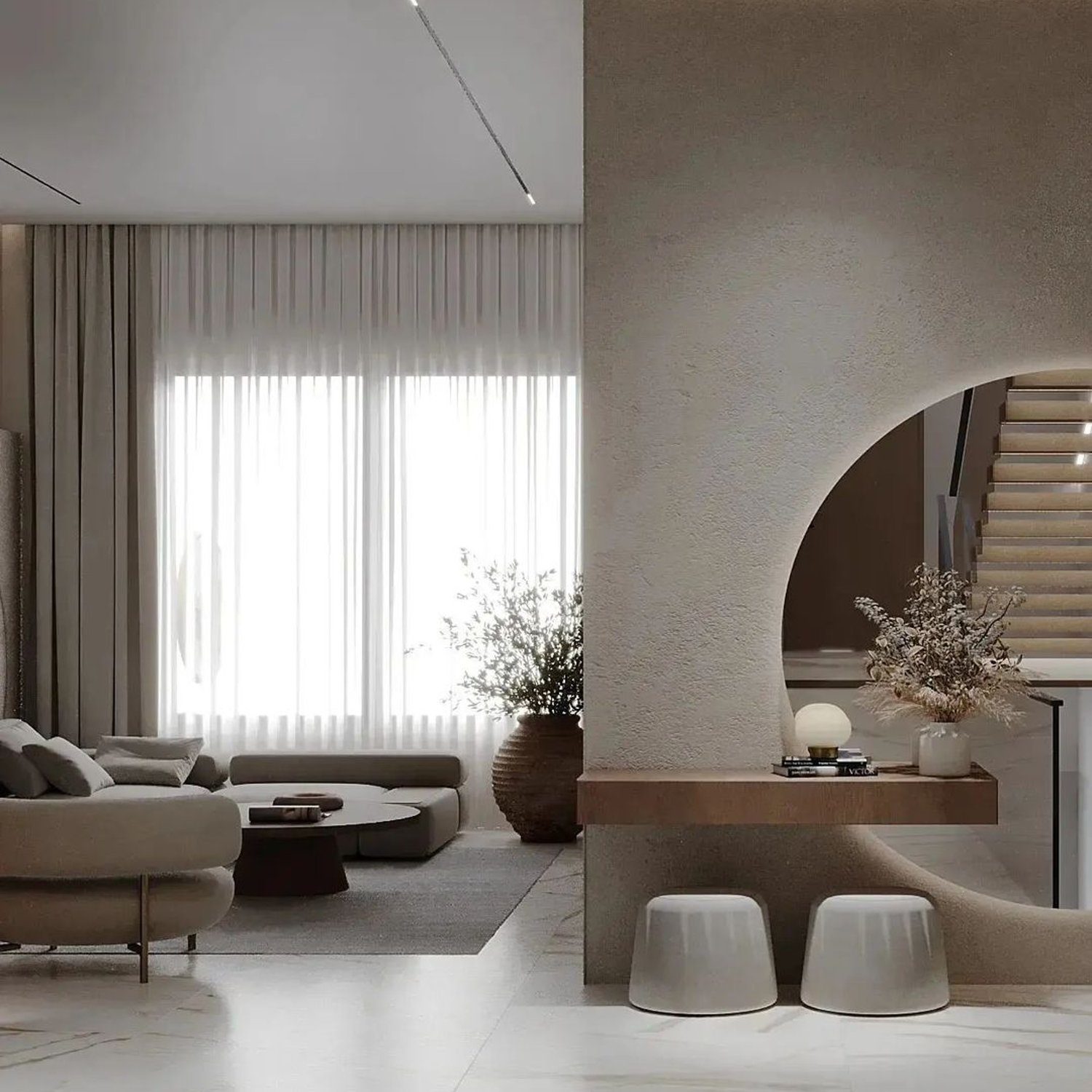 A subtly lit, modern living room seamlessly blending textures and monochromatic tones.