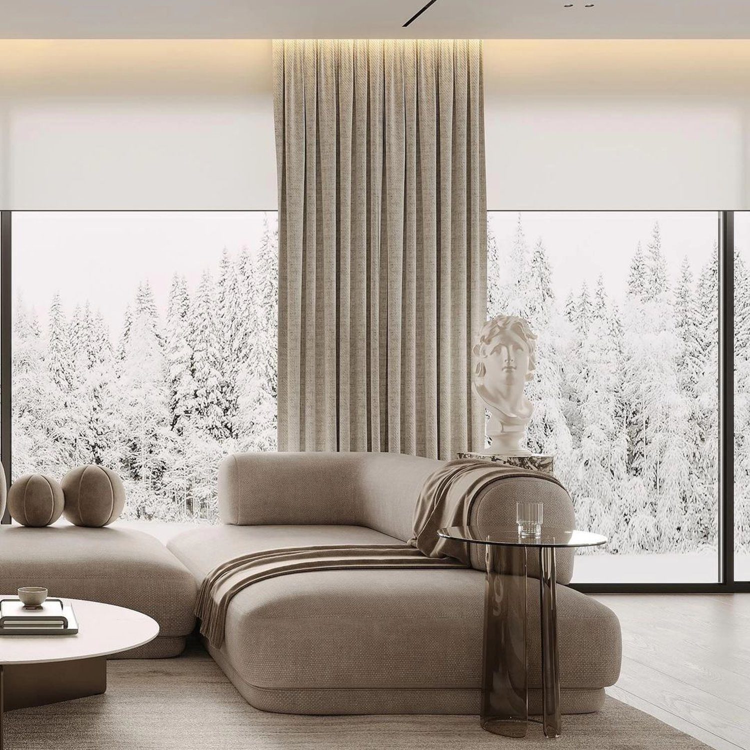 A modern minimalist living room overlooking a winter landscape