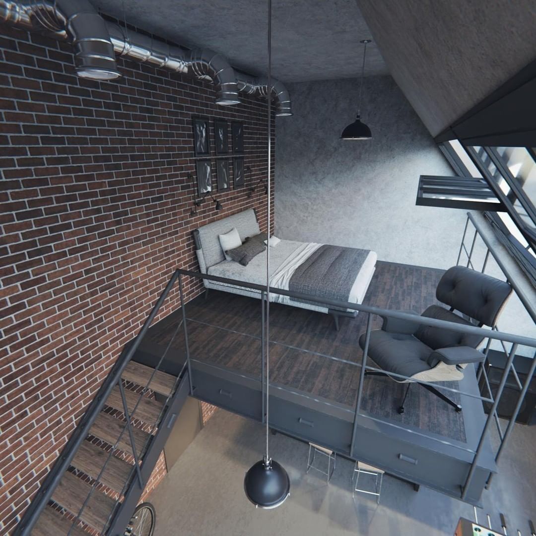 Loft style bedroom with exposed brick wall