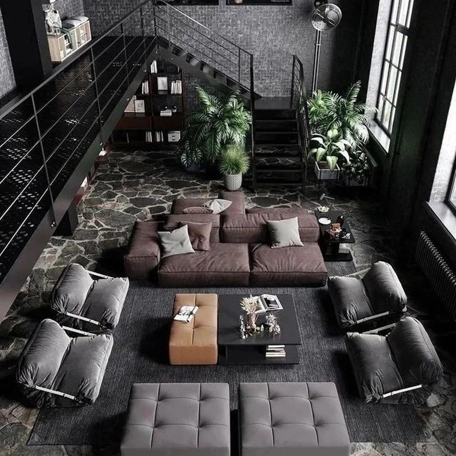 A sleek and modern loft living room with dark hues and lush greenery.