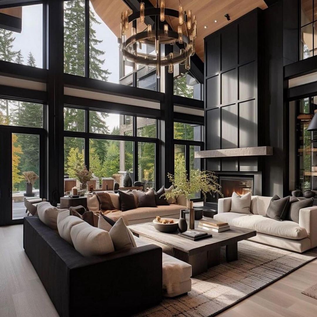 A modern and luxurious living room with tall ceilings and expansive windows