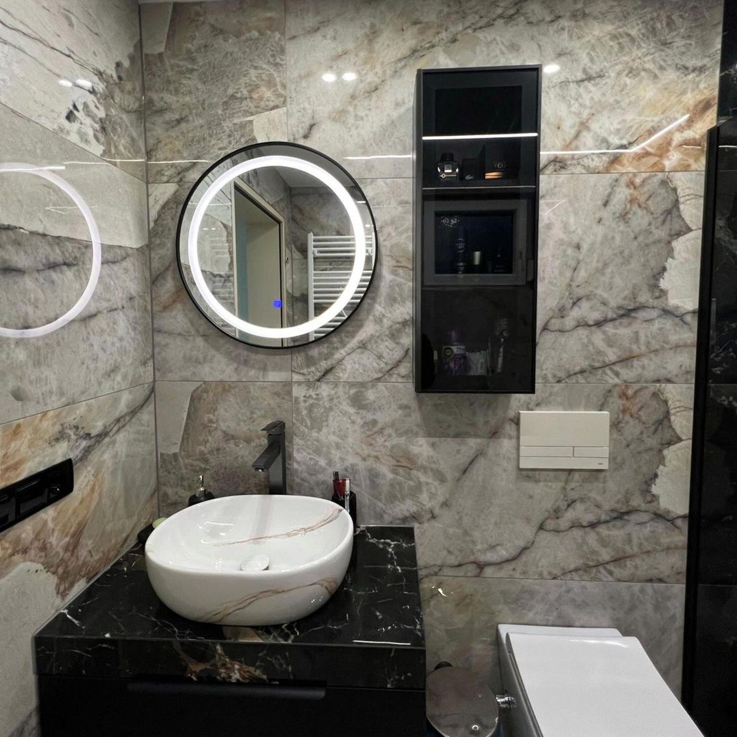 A modern bathroom with elegant marble tiling