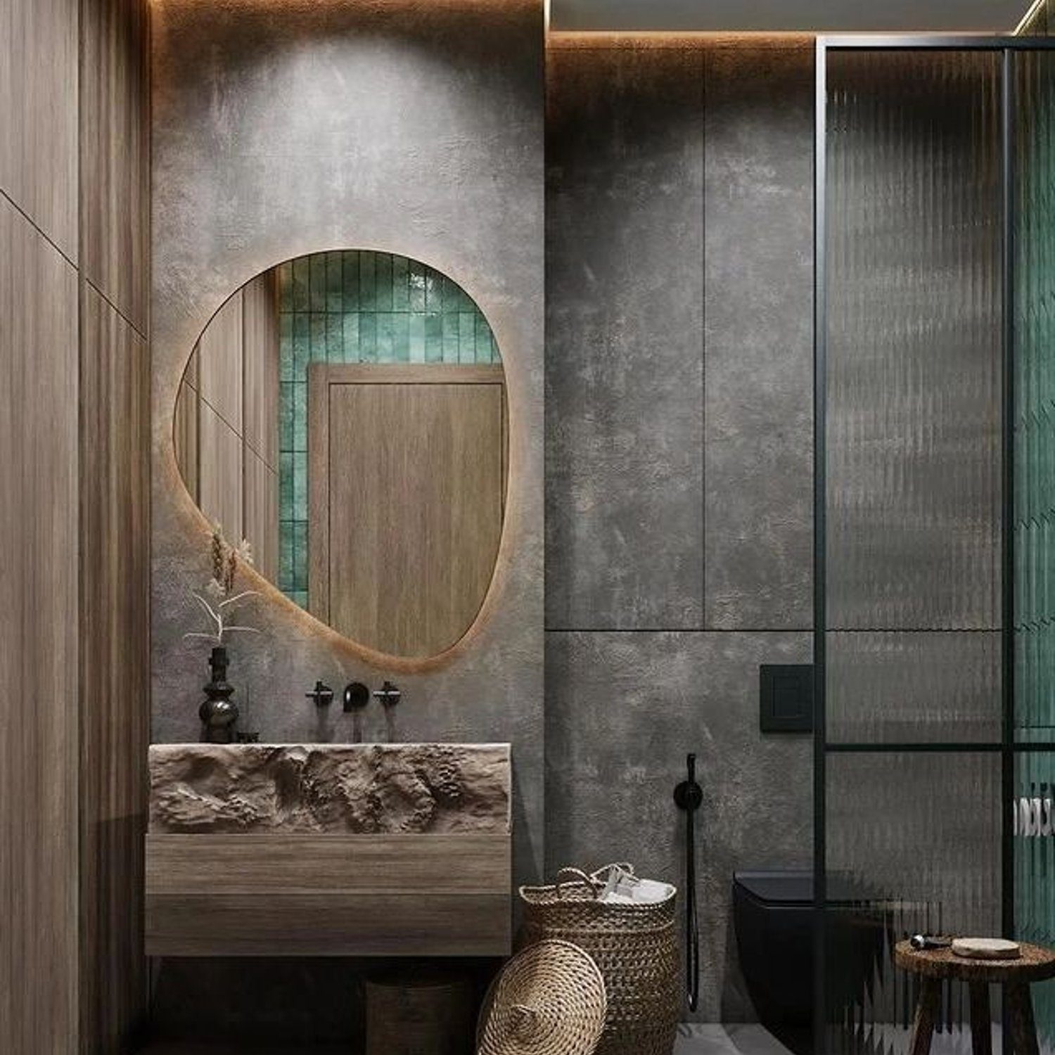 A contemporary bathroom design featuring a unique oval mirror set against a backdrop of sleek grey tones, wood accents, and minimalist fixtures.