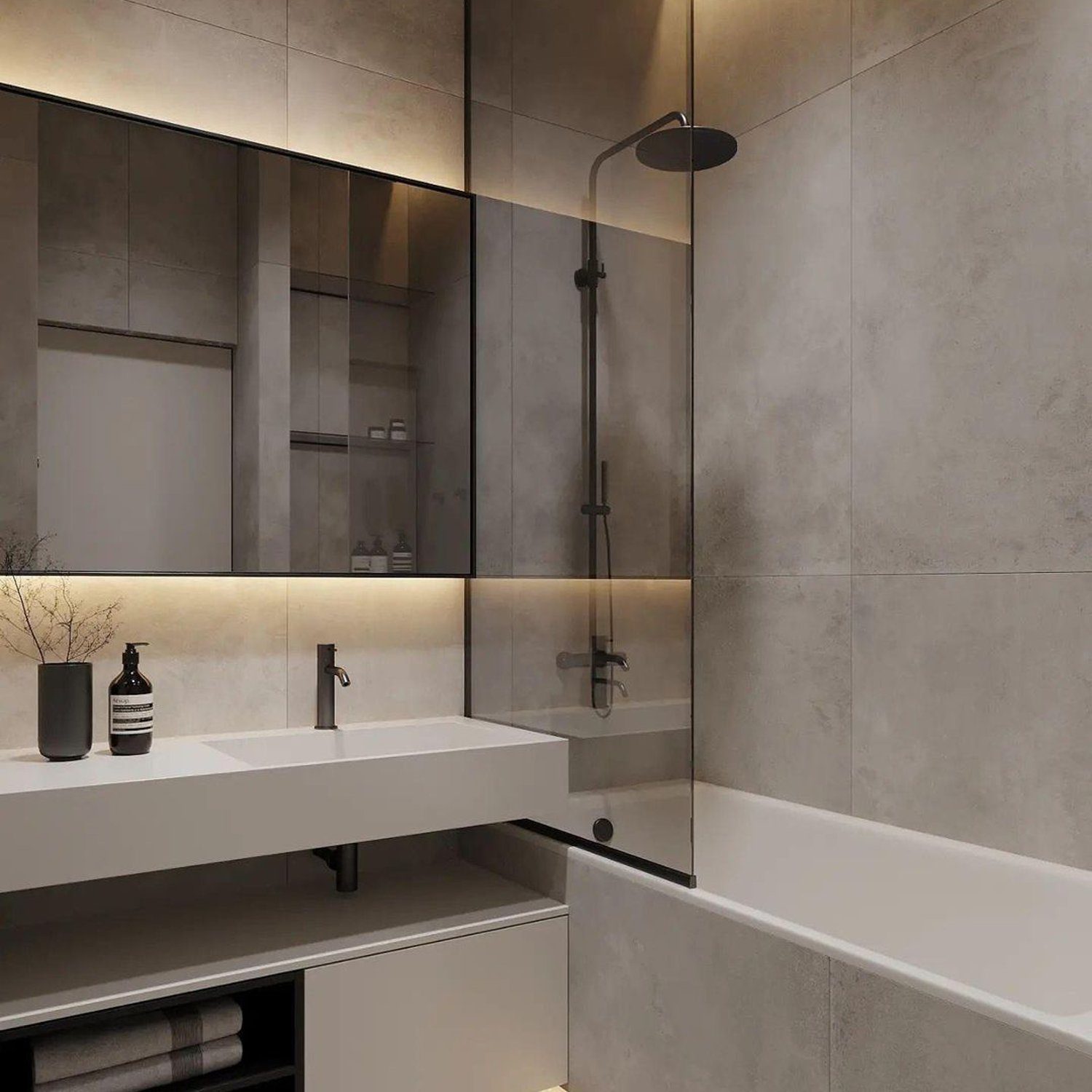 A modern minimalist bathroom featuring sleek grey tiles