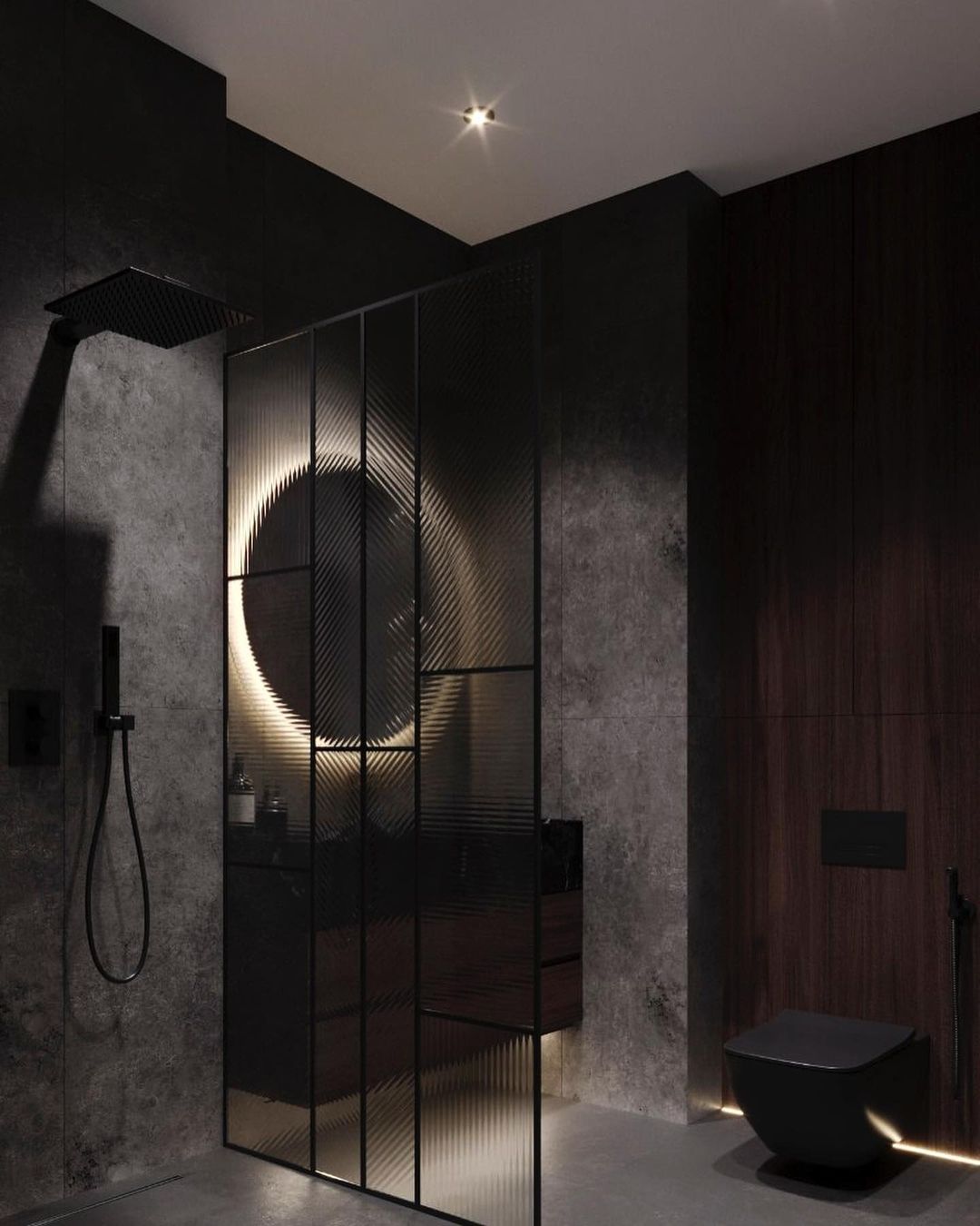 A modern minimalist bathroom featuring a dark palette