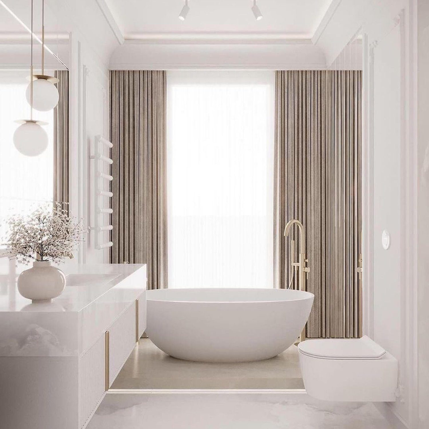 Elegant minimalist bathroom with a freestanding bathtub and gold fixtures