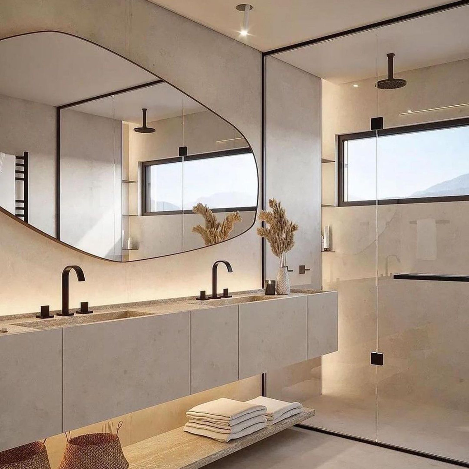 Modern minimalist bathroom with a unique mirror design