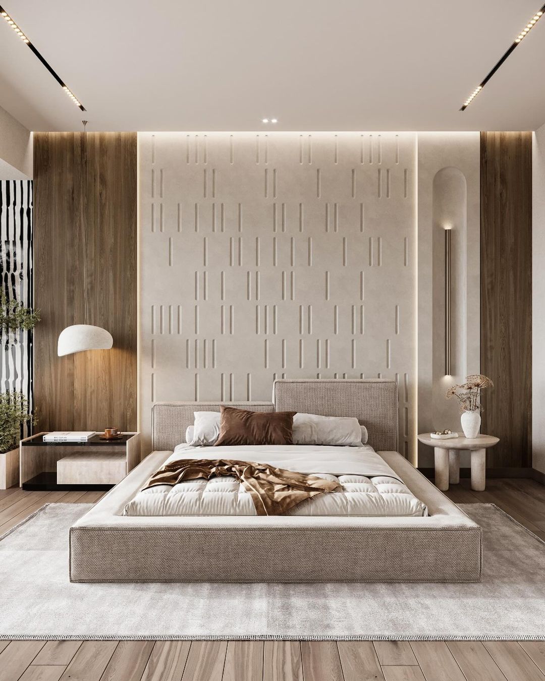 A modern bedroom featuring a minimalist design with a textured bedspread and clean lines