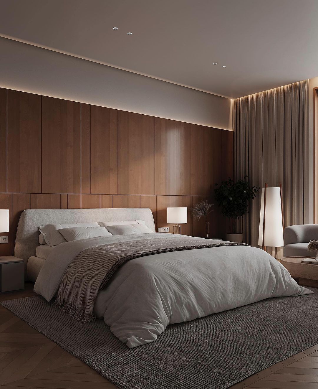 A modern minimalist bedroom featuring wood-paneled walls and a plush, neutral bedding set