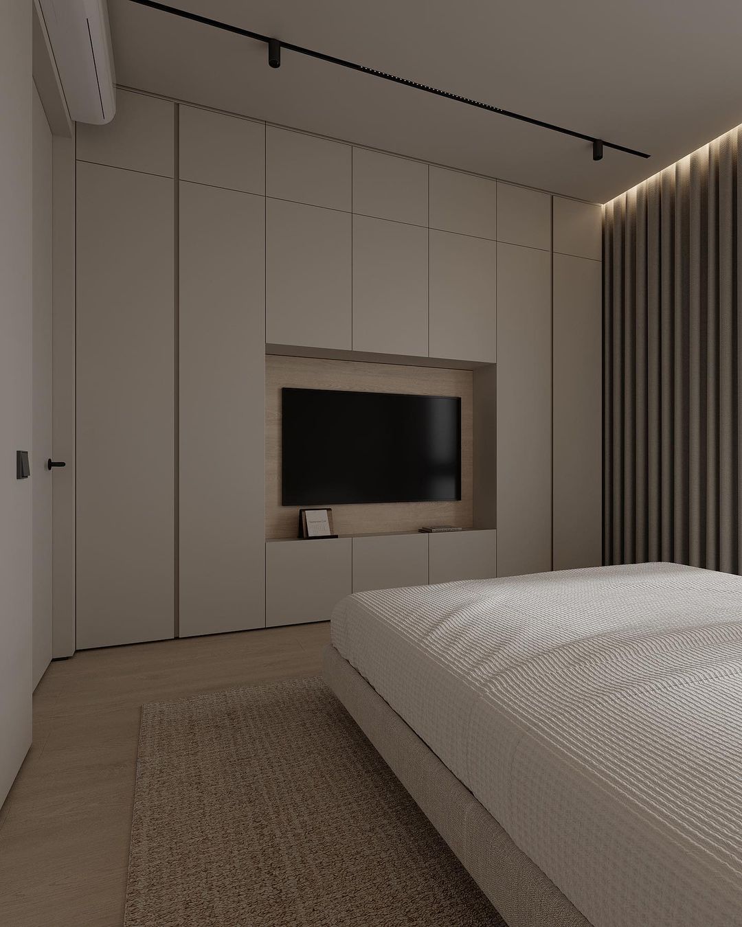 A minimalist bedroom with harmonious tones