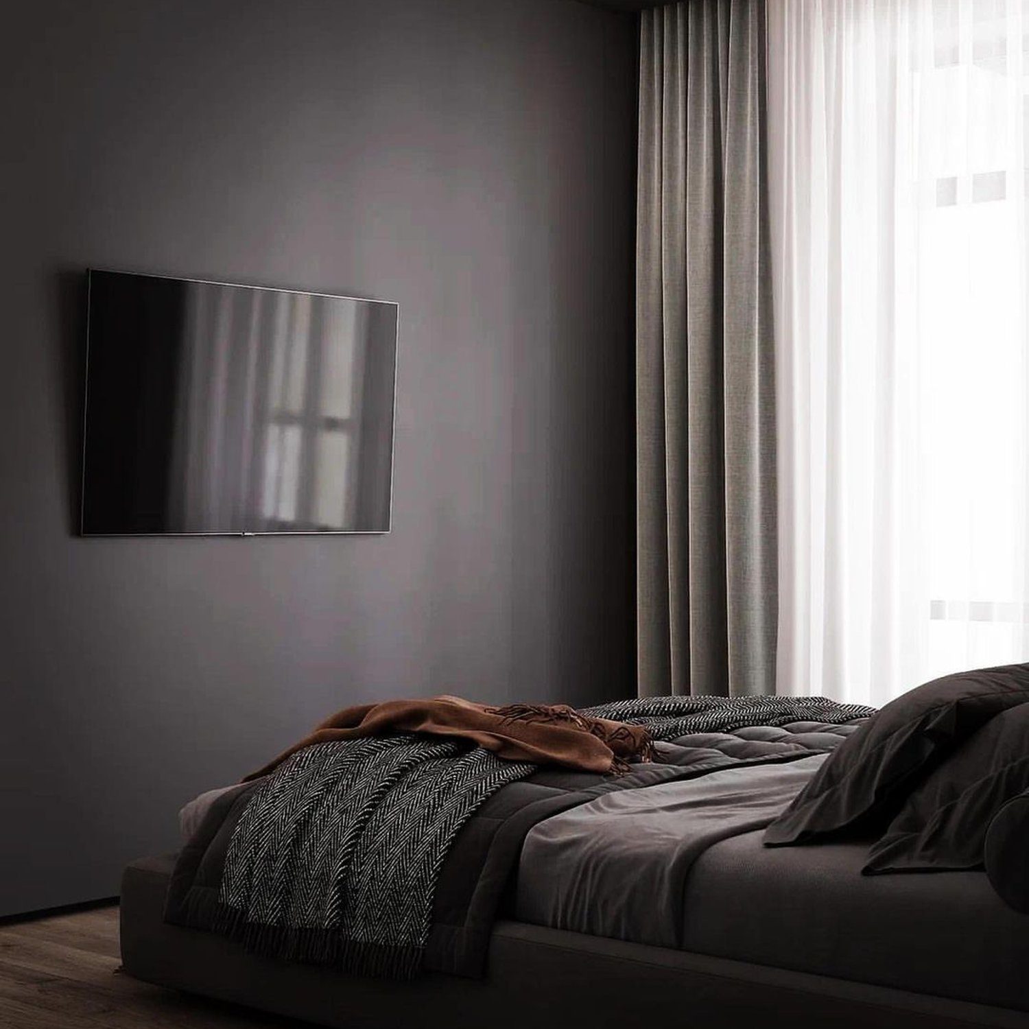 A modern bedroom with a minimalist design