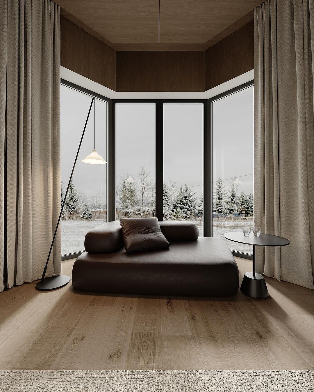 A modern minimalist bedroom with large windows