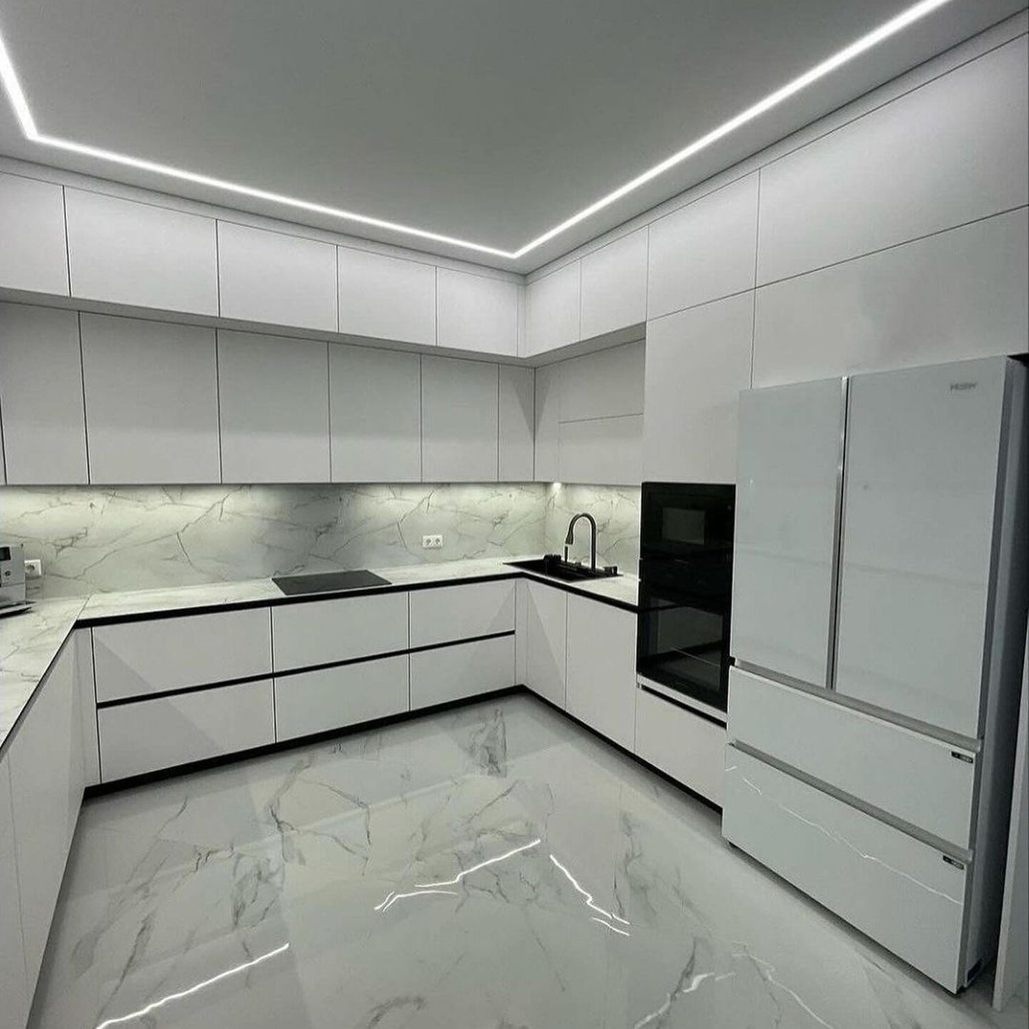 A modern minimalist kitchen with sleek finishes and advanced appliances