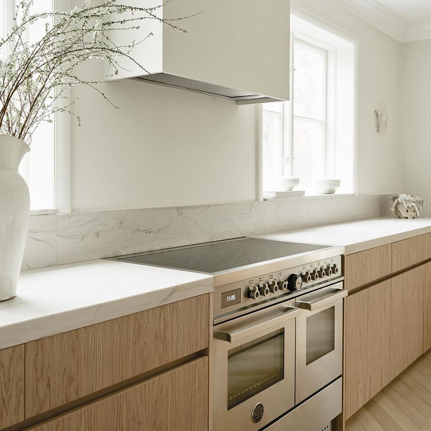 A modern minimalist kitchen with natural light