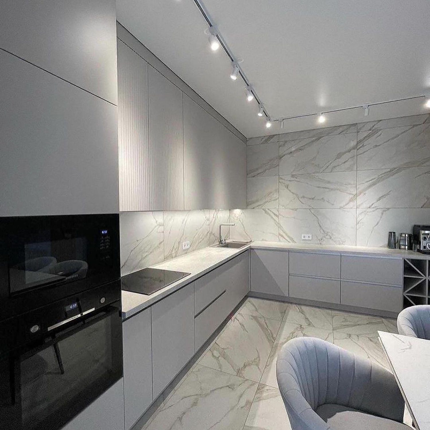 Stylish and modern kitchen with marble elements