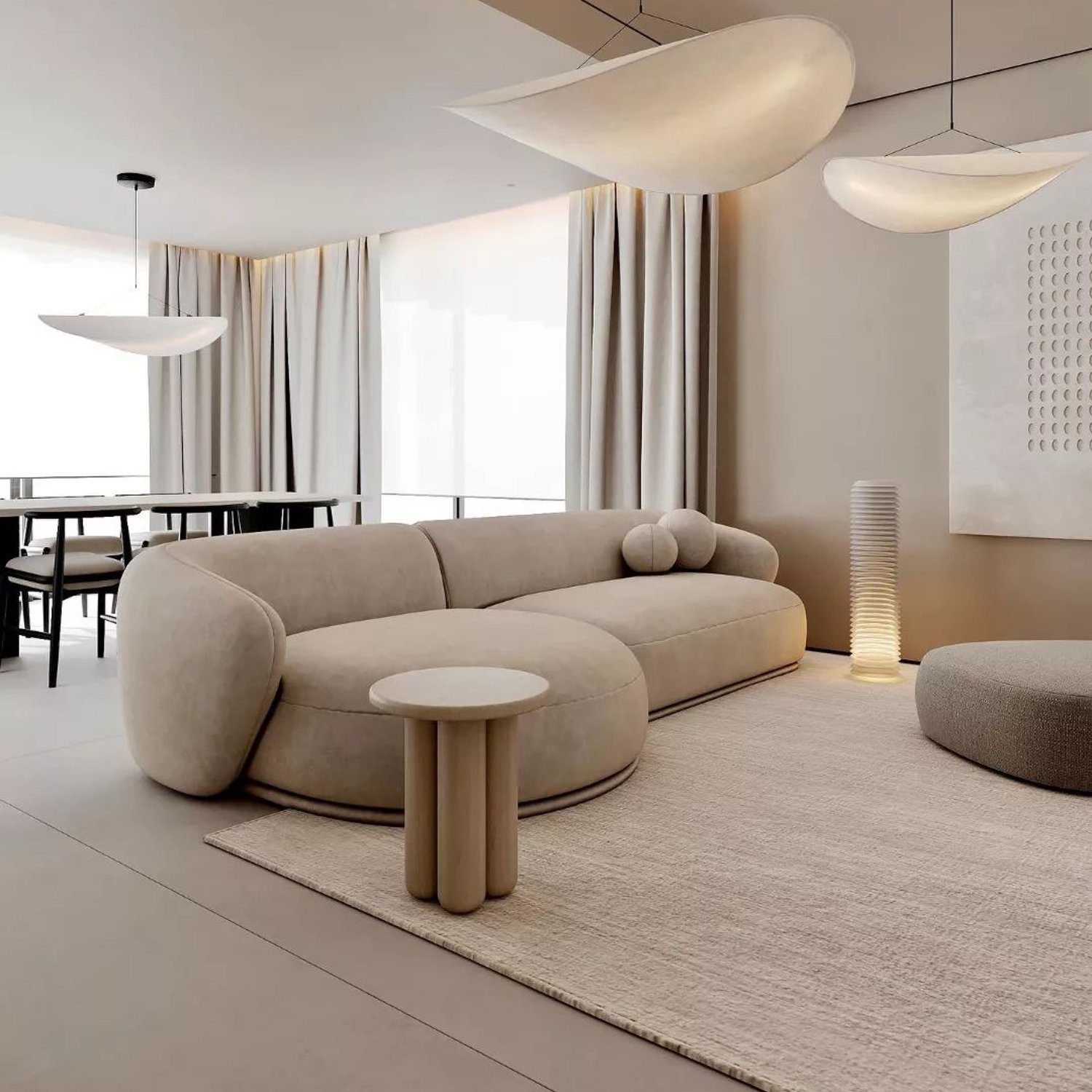 A modern and minimalistic living room design with an emphasis on soft curves and neutral tones