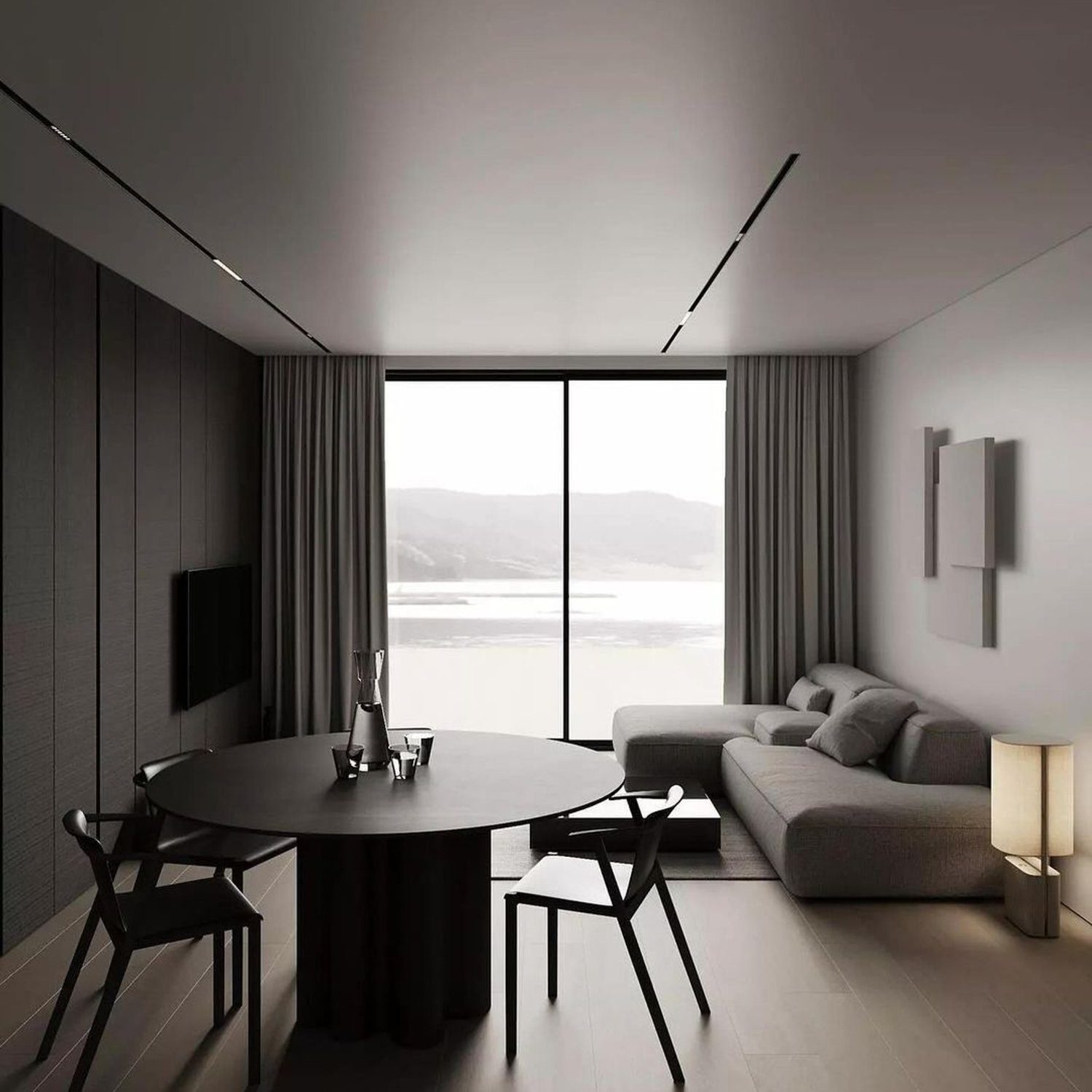 A modern minimalist living room with a scenic view