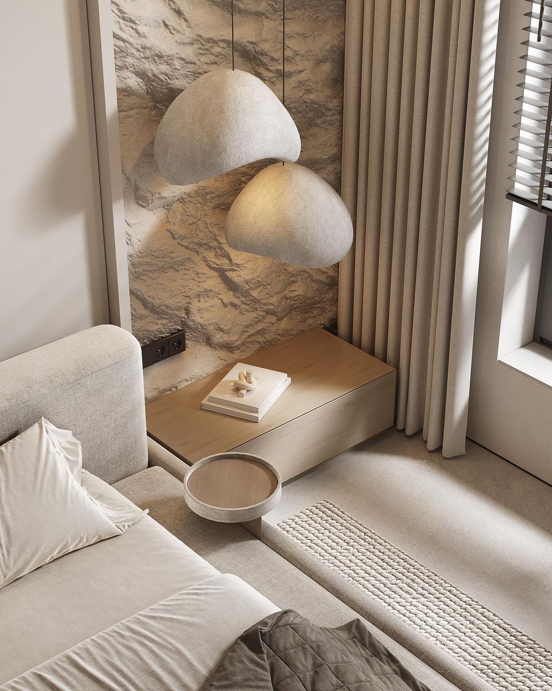 A cozy and textured living room corner featuring organic forms and neutral tones