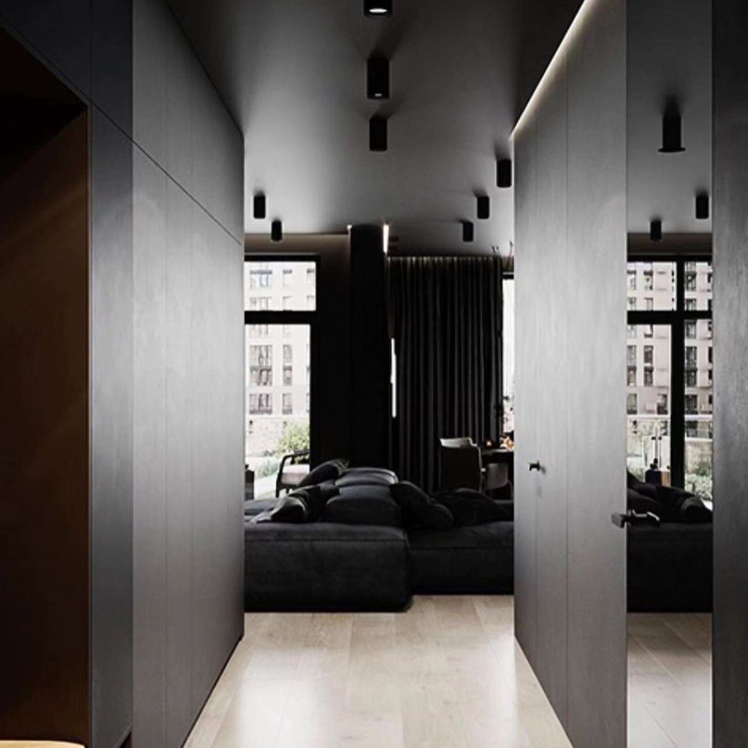 A modern minimalist interior design with a monochrome palette