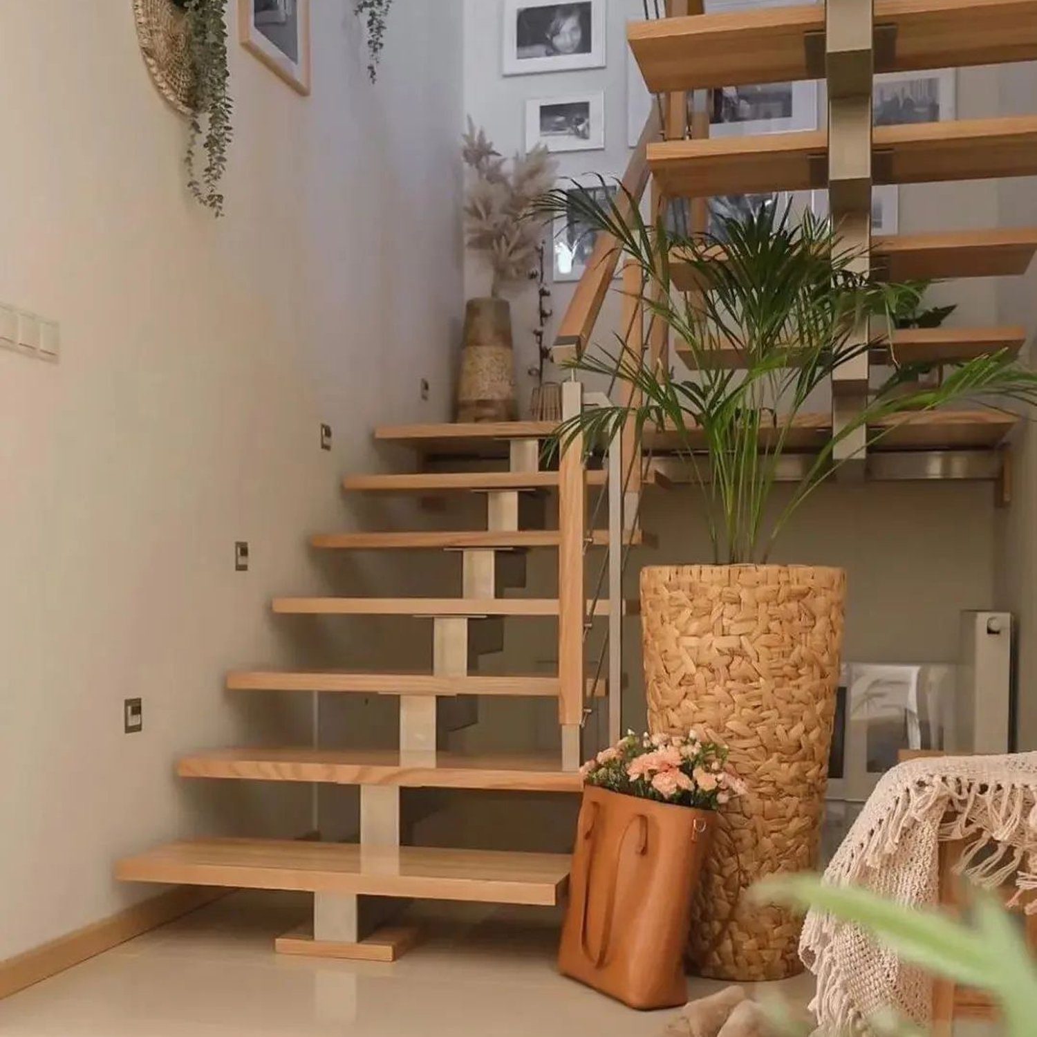 A modern home interior with a minimalistic wooden staircase