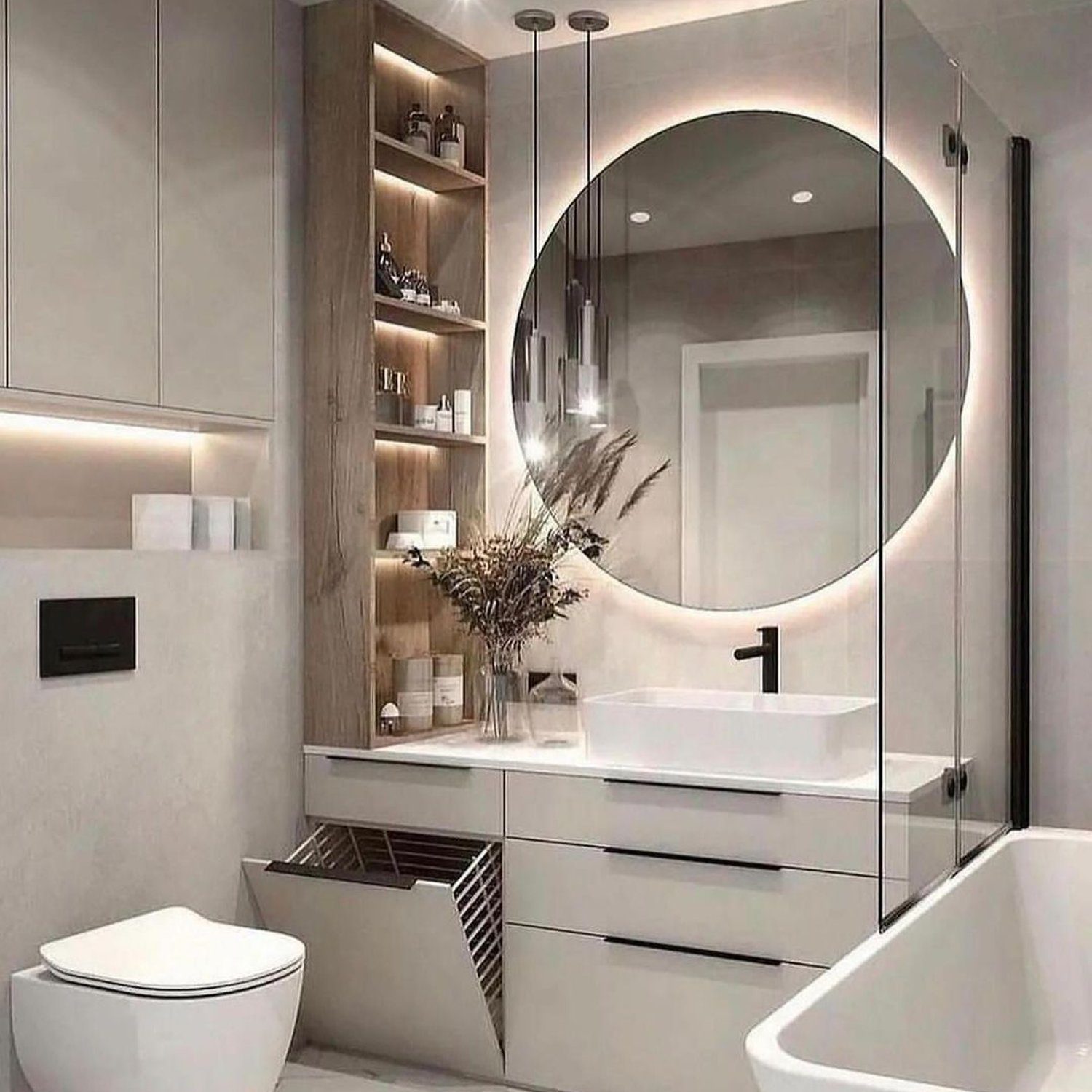 A chic and modern bathroom design featuring neutral tones and sleek fixtures.