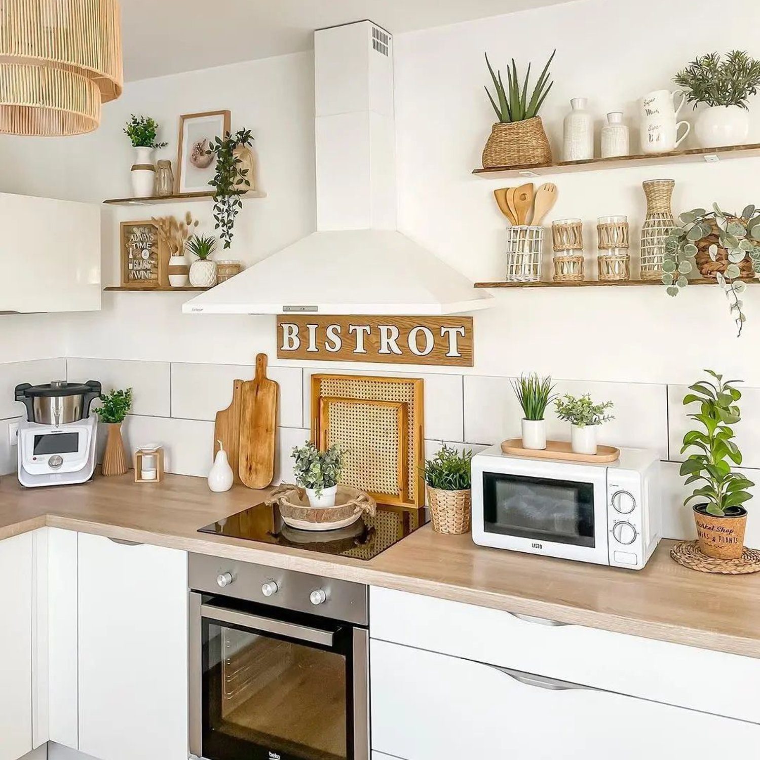 A meticulously arranged kitchen with floating shelves showcasing plants and decorative items