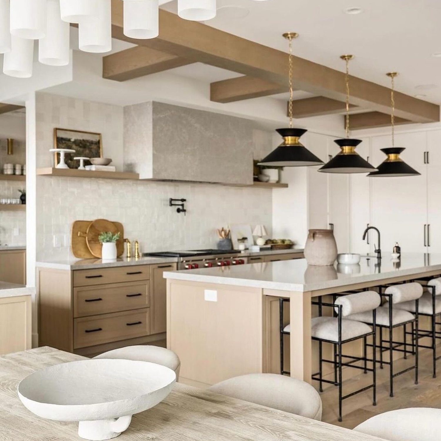 A modern kitchen blending rustic wood elements with sleek contemporary finishes