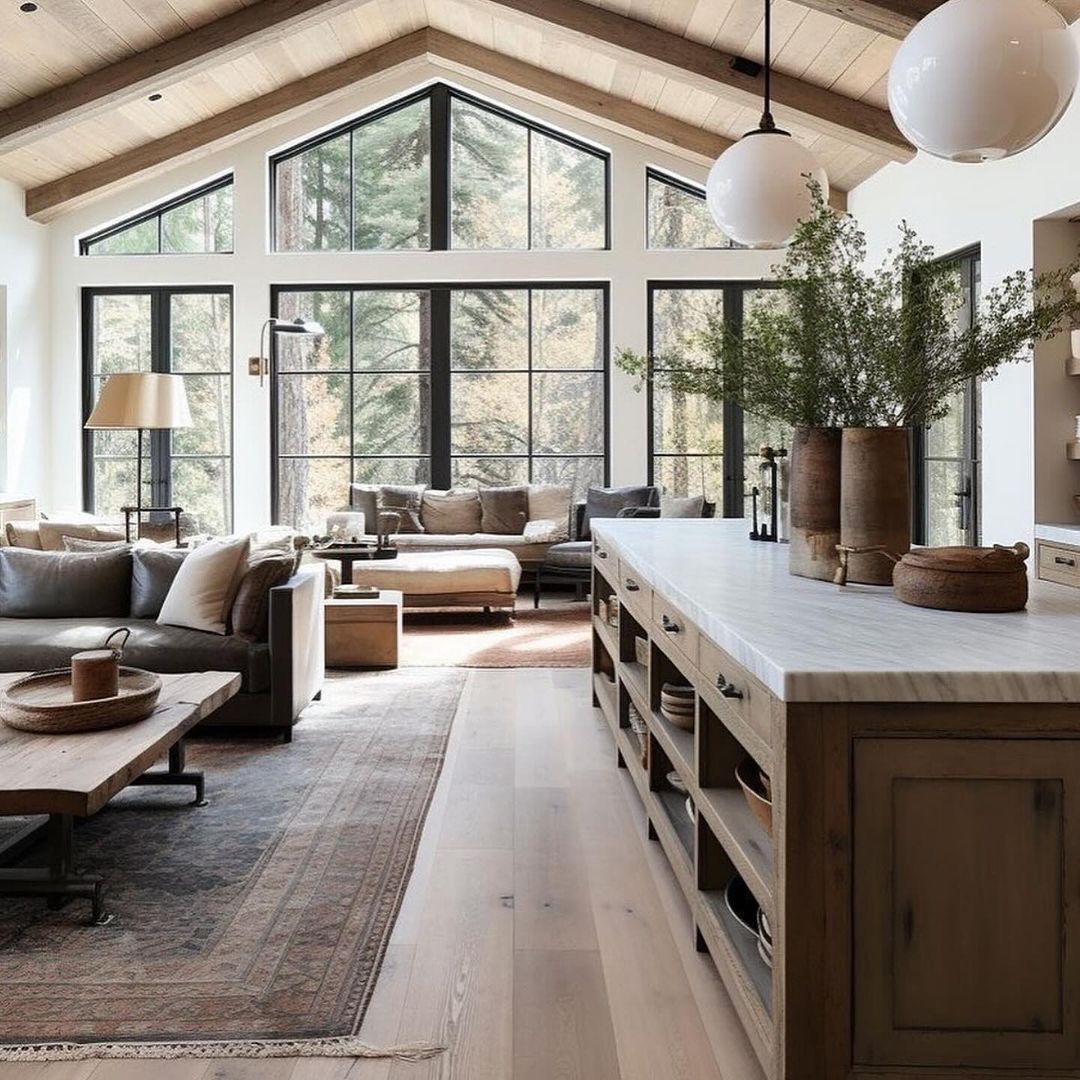 A serene and inviting living room with high ceilings and large windows