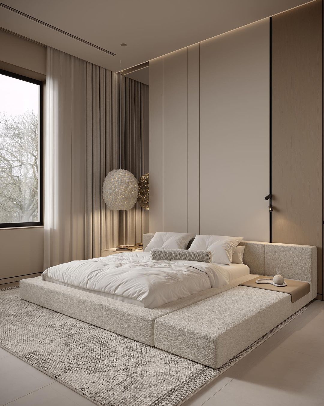 A modern and serene bedroom featuring a low-profile bed with textured fabric and a matching built-in bench