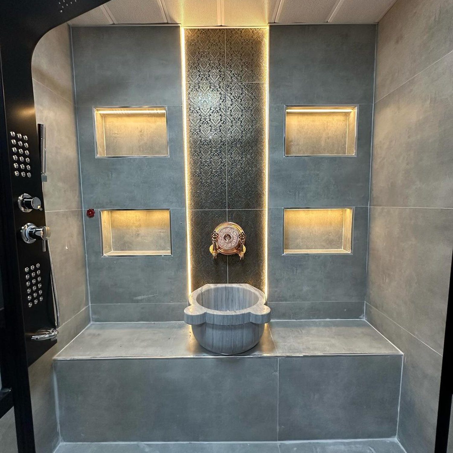 A luxurious modern shower with LED lighting and multiple showerheads