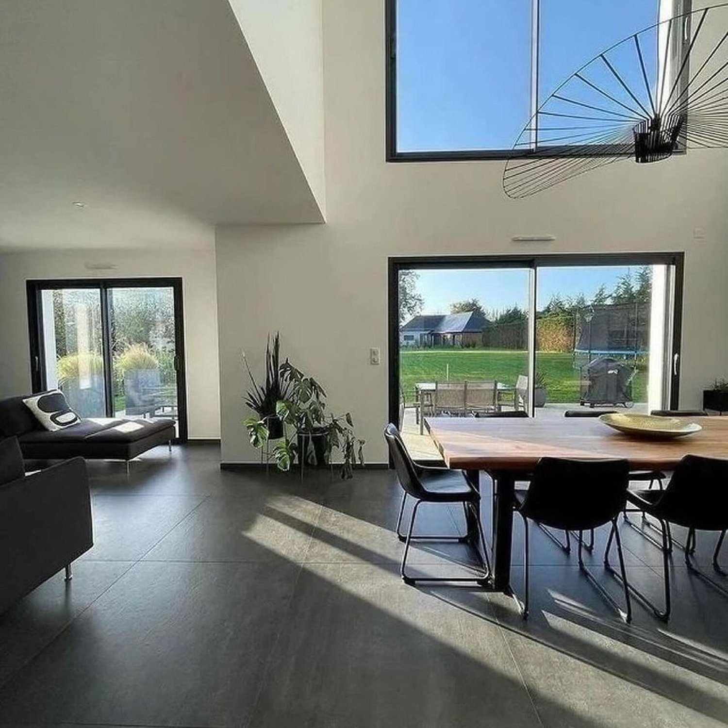 Modern spacious living room with high ceilings