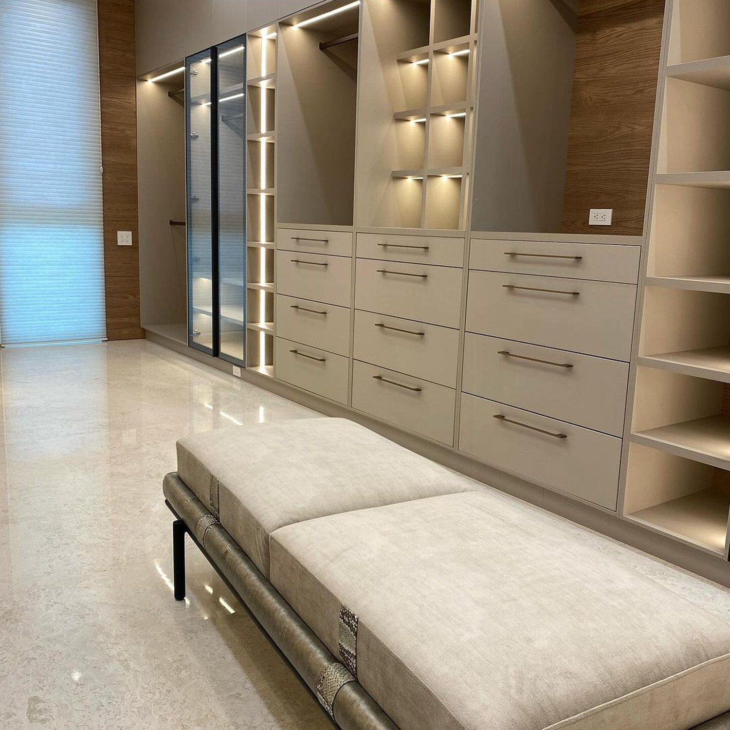 Elegantly designed walk-in closet with optimized storage solutions