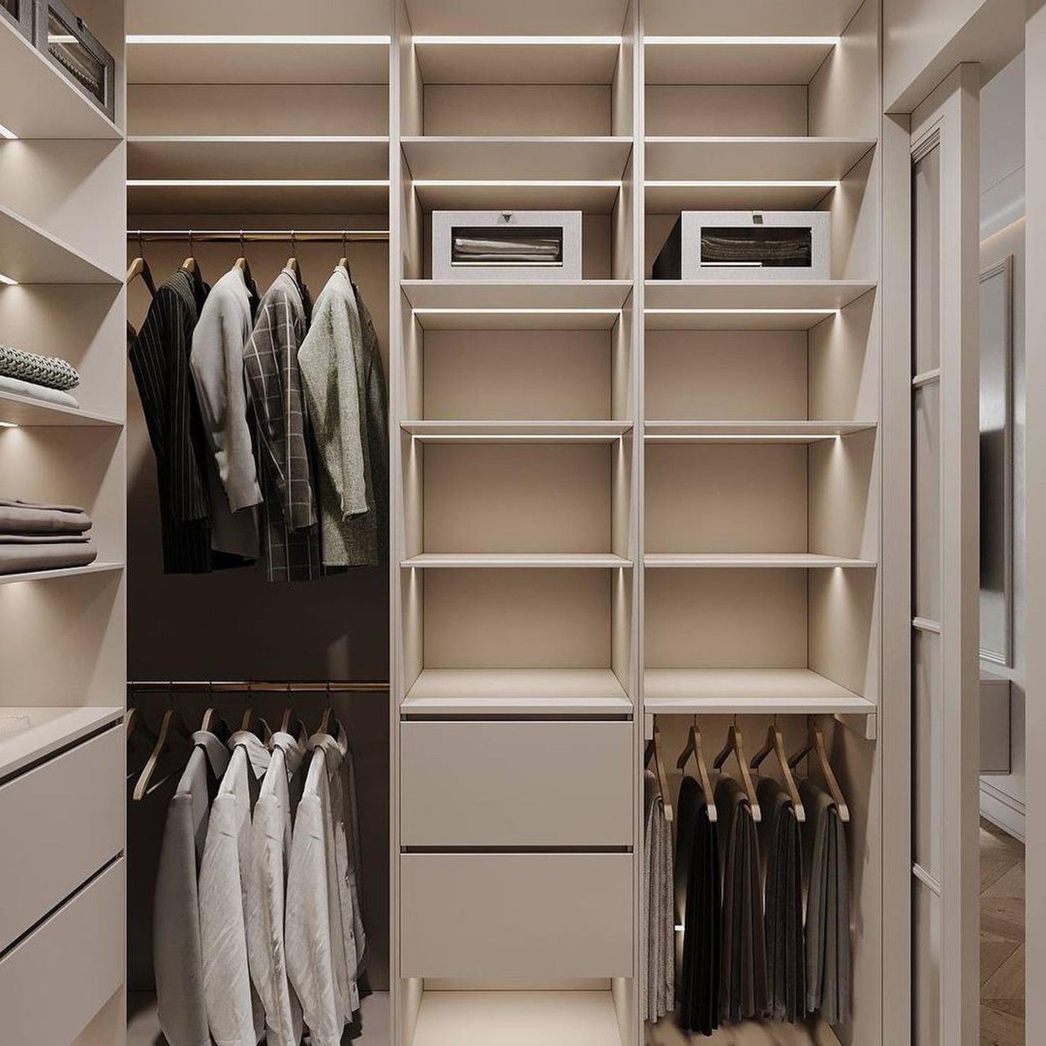 Elegantly designed modern walk-in closet with neatly arranged clothing and ample shelving