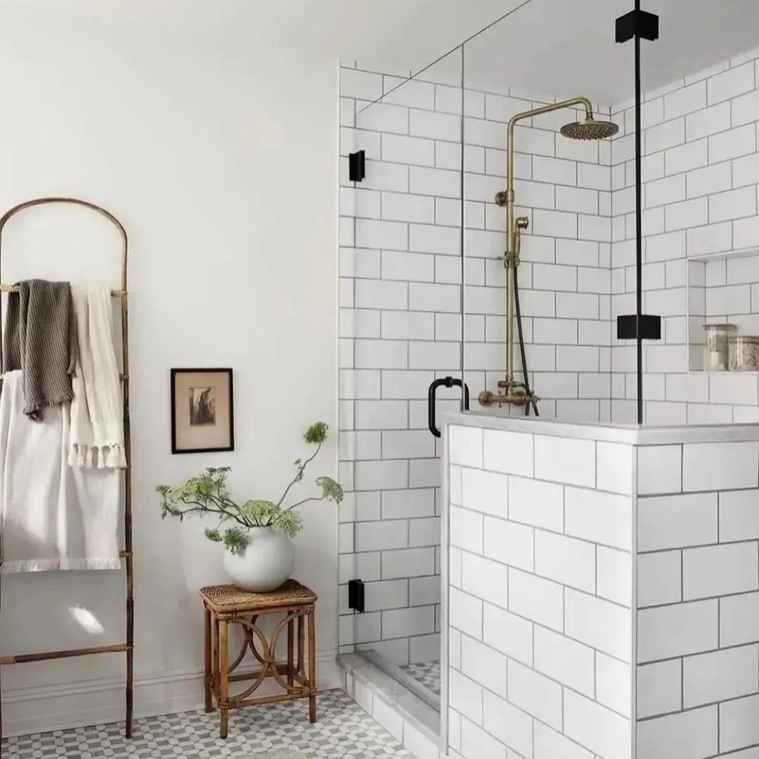 Elegant and minimalist white bathroom with a walk-in shower