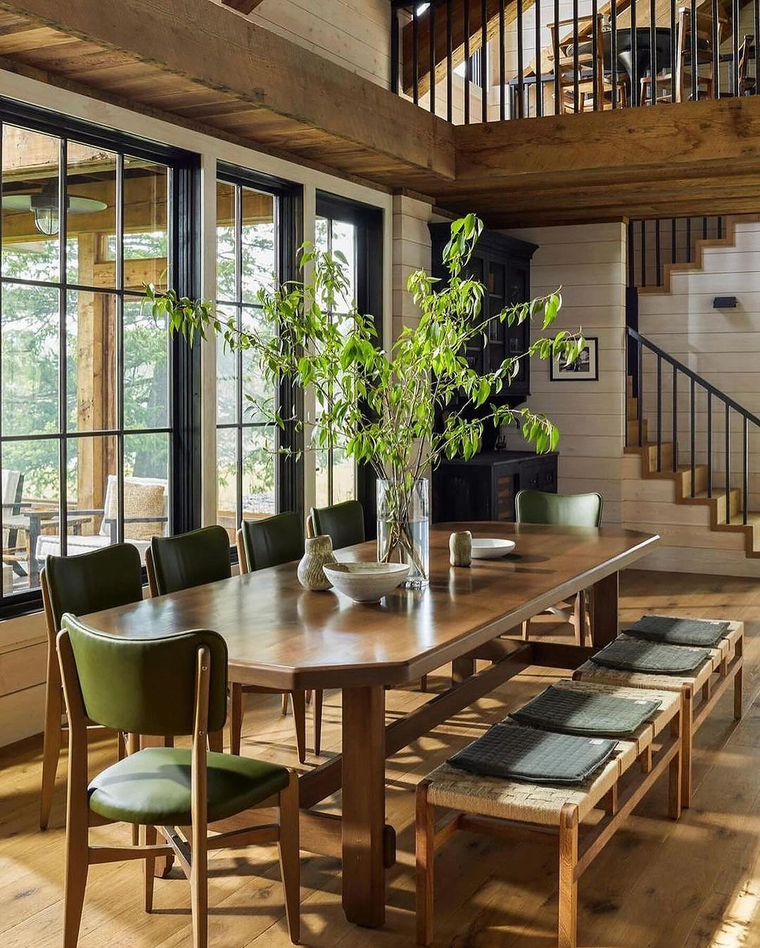 A harmonious blend of natural light and wood elements in a spacious dining area