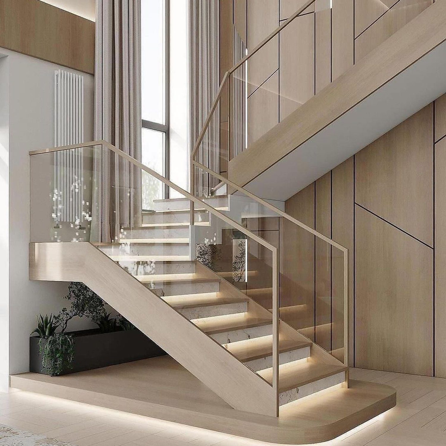 Elegant wooden staircase with glass railings in a modern home.