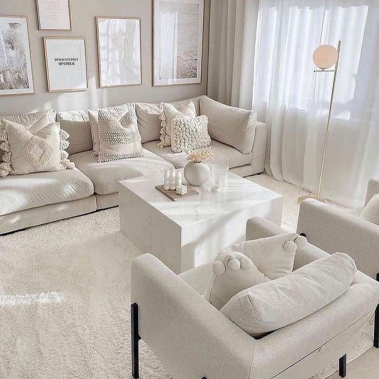 A serene and monochromatic living room setup